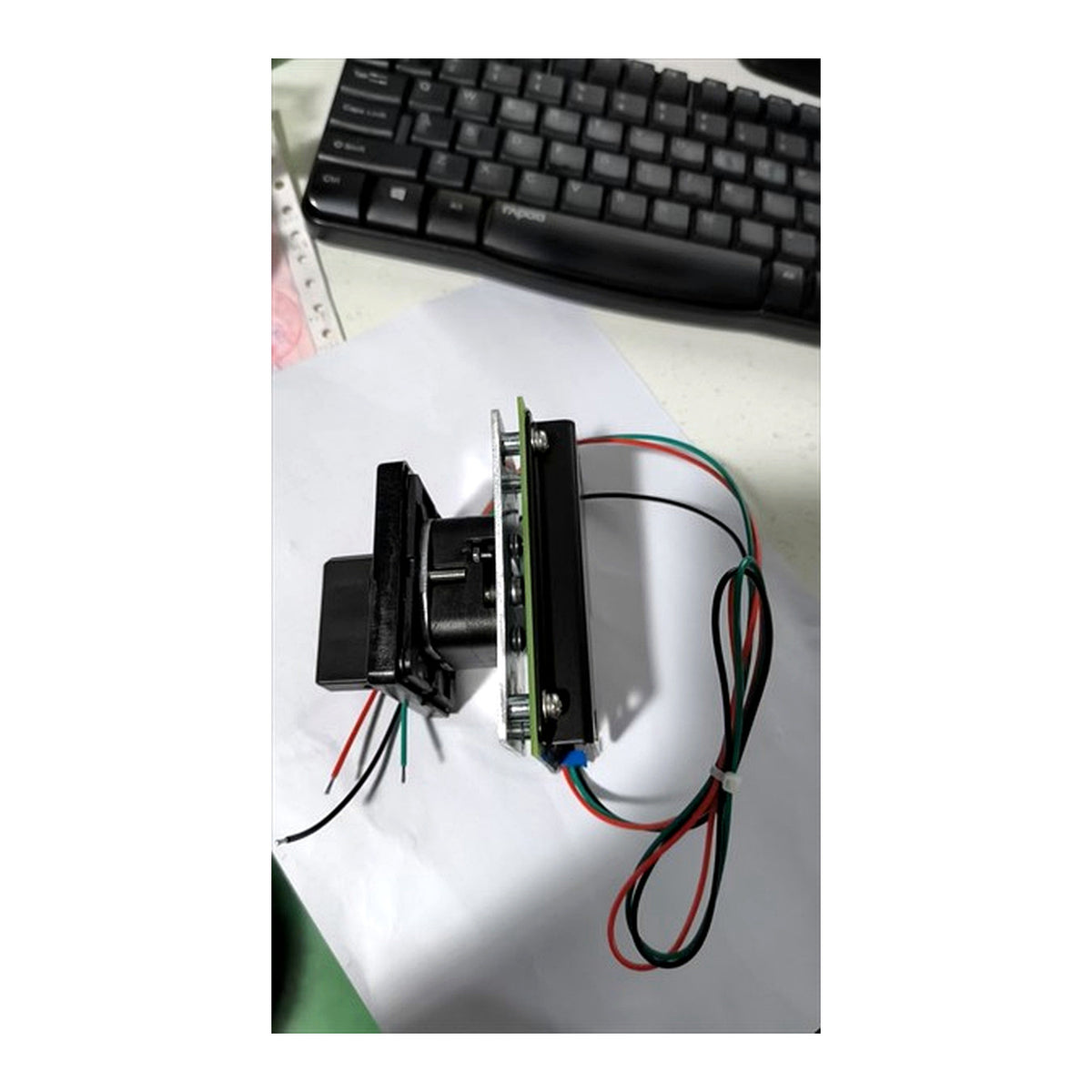 Actual side view of 36557GT controller showing mounting structure and wiring